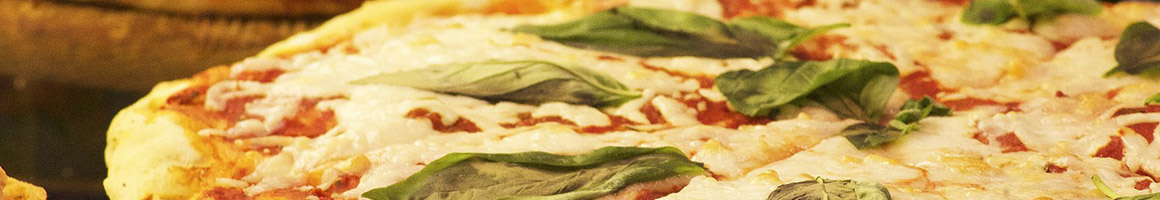 Eating Italian Pizza at Mamma Mia Pizzeria restaurant in Hudson, FL.